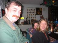 Peggy peeks out between Mark and Becki