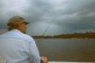 Arlen tends his line while we keep an eye on an approaching storm.