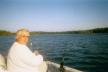 Captain Don getting distracted as we drift fish on a perfect Kelly Lake day.