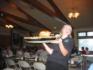 A waitress brings the feast at Holiday Inn's Friday Fish Fry