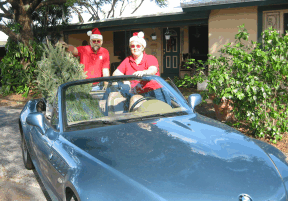 Marshall and Sharon bringing home the traditional Christmas tree, Dec 2002